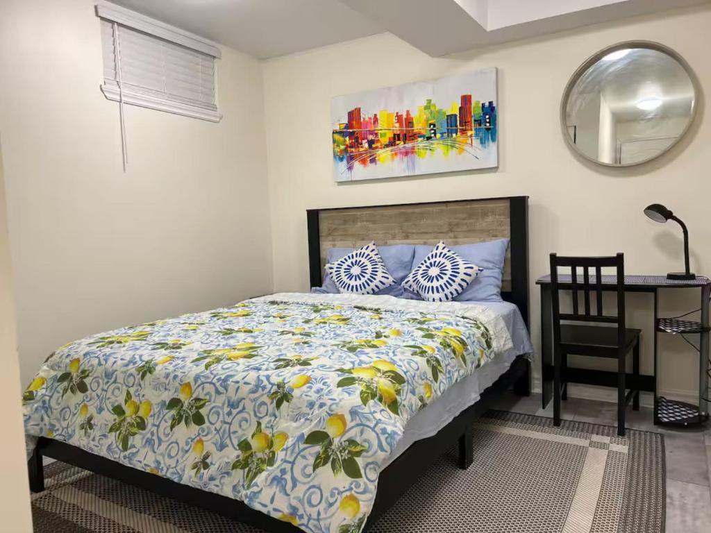 Superior Queen Room at Stylish City Escape, Etobicoke, queen bed, work desk and mirror